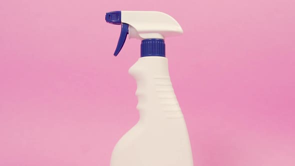 White Spray Bottle with Household Chemicals