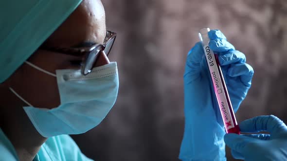 Doctor hands holding a coronavirus COVID-19 negative test tube