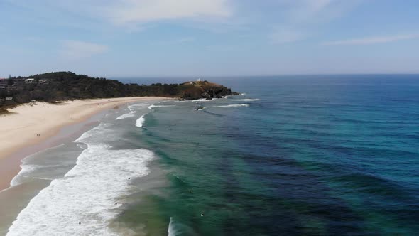 Flying over Sandy Beautiful Beach along the Sea Shore at Port Macquarie, New South Wales Australia alt