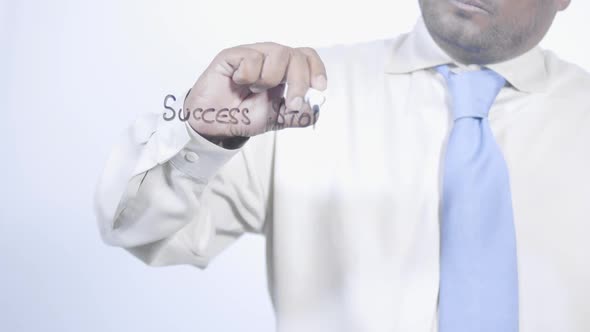 Asian Businessman Writes Success Story