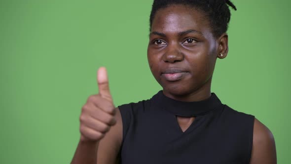 Young Beautiful African Businesswoman Giving Thumbs Up