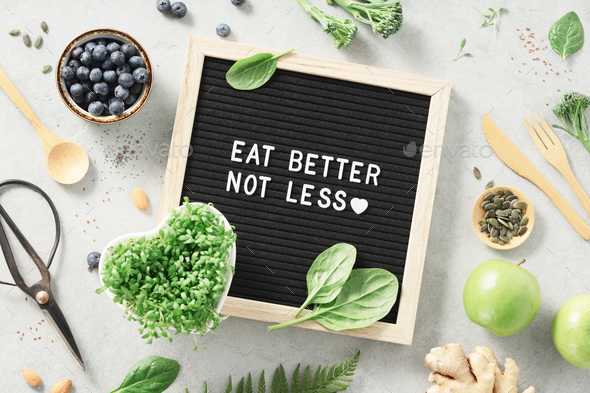 Eat better not less letter board quote flat lay