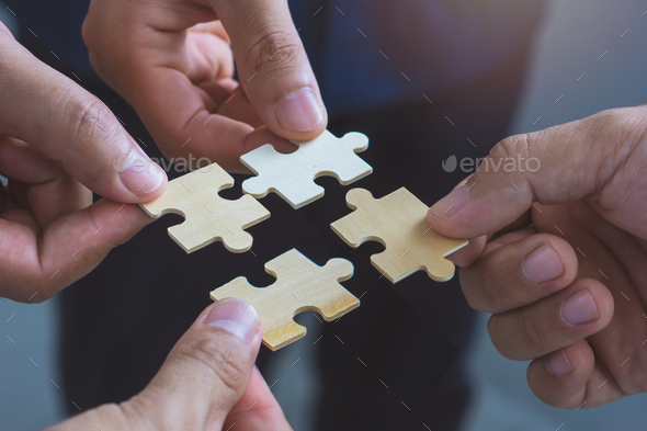 Three Jigsaw Pieces (unity Symbol) Stock Photo, Picture and