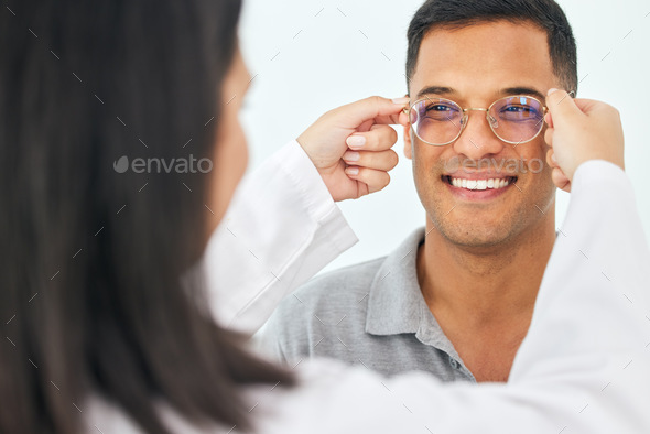 Eye care, glasses and happy man with lens from optician for vision, eyesight and optical frames. Fa