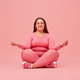  Happy plus size woman in sportswear sitting in yoga lotus pose, meditating  - PhotoDune Item for Sale