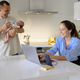 Happy family with newborn baby in kitchen - PhotoDune Item for Sale
