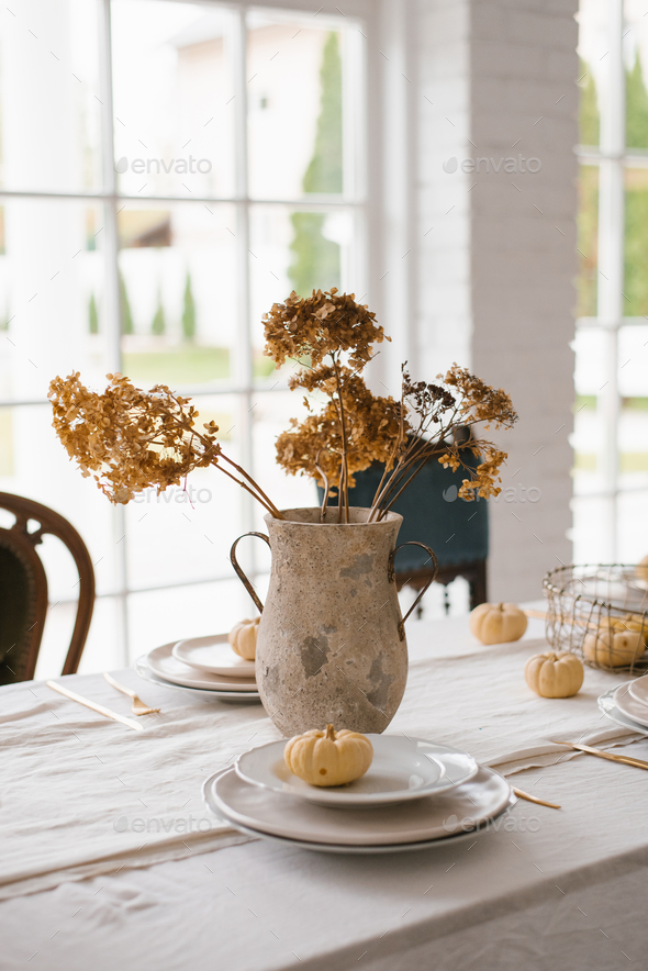 Table Setting for Thanksgiving. Dried Hydrangea Flowers in a Vase