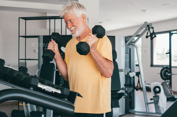 Senior Fitness Man Doing Biceps Curl Exercises Inside Gym Fit