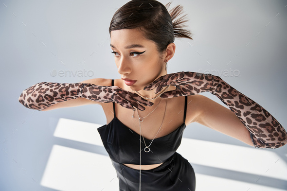 Leopard print dress with black clearance top underneath