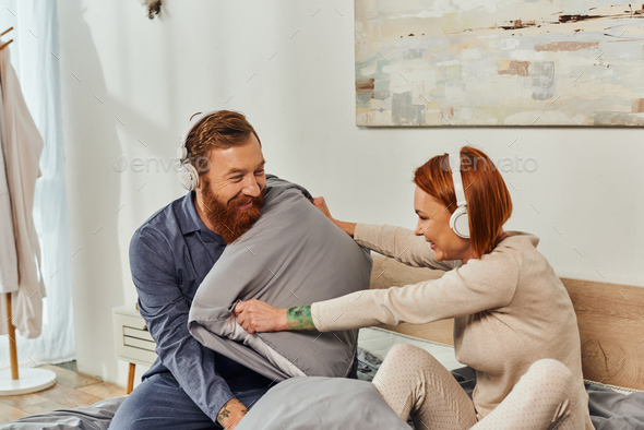 parents alone,having fun,shared music,redhead husband and wife
