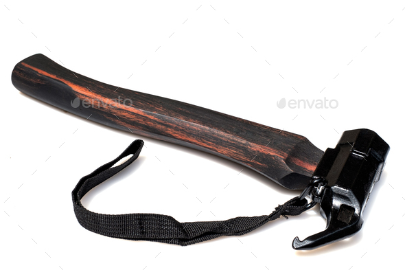 The tent peg nail iron hammer handle is made of ebony wood isolated on white background