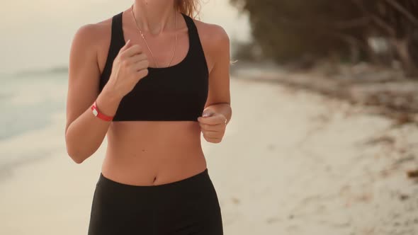 Fitness Girl Running On Morning At Sea. Female Intensive Running. Exercising Runner Cardio Jogging. alt