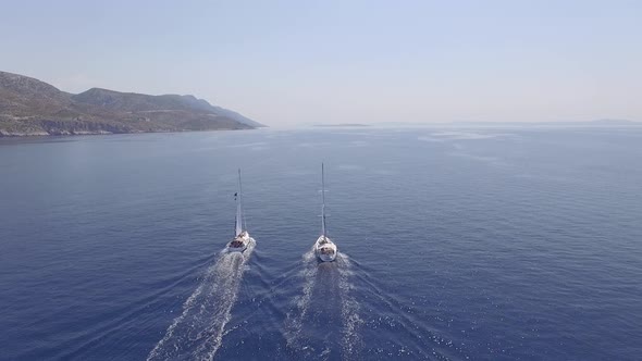 Aerial shot two Yachts Sail on the sea