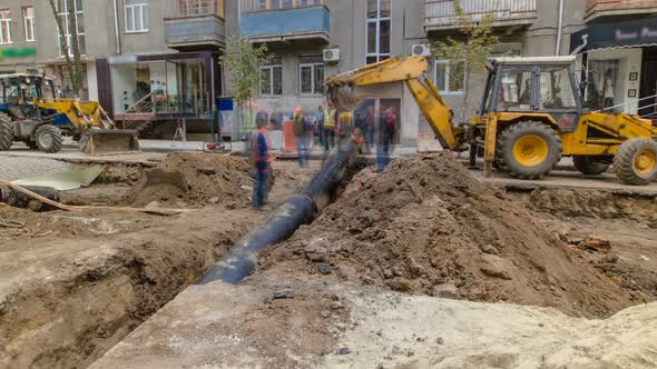 Excavator at Working on Pipeline Construction Site of Replacing Water Supply Pipe Timelapse alt