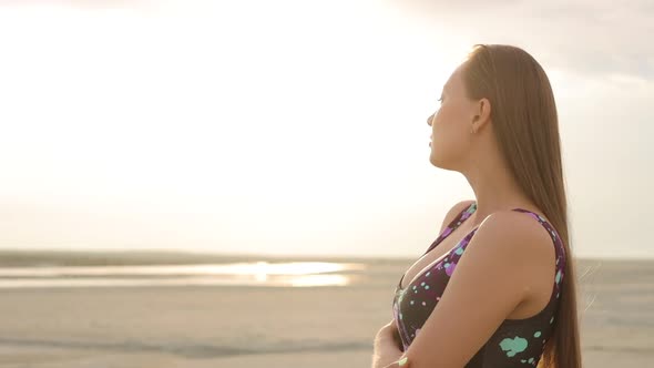 Sensual Woman in Black Bikini Standing and Enjoying Sunshine