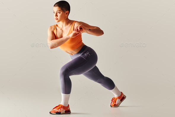 Curvy woman doing fitness exercises Stock Photo