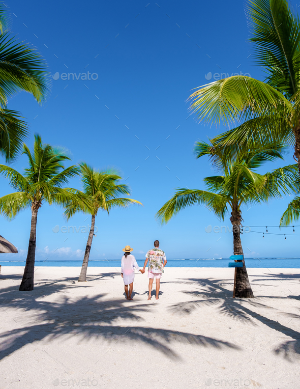 Man And Woman On A Tropical Beach In Mauritius A Couple On, 41% OFF