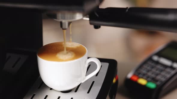 Process of Making Coffee by Coffee Machine Into Cup Espresso Coffee Coming Out
