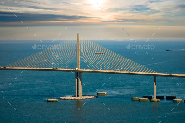 Aerial view of Sunshine Skyway Bridge over Tampa Bay in Florida with moving traffic.