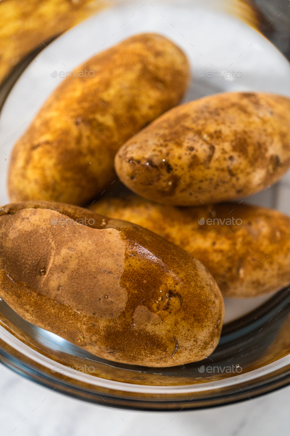 Pressure Cooker Baked Potatoes Stock Photo by arinahabich PhotoDune