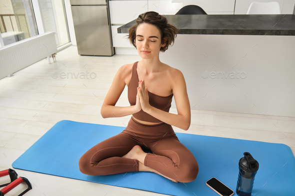 Young Woman Lotus Pose Yoga Mat. This Is Part Of A Series Of