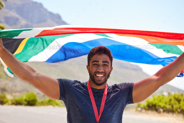 Runner, winner and portrait of happy man with flag on road for fitness goal, winning or running rac