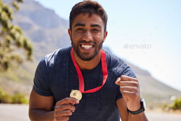 Runner, winner and portrait of happy man with medal on road for fitness goal, winning or running ra