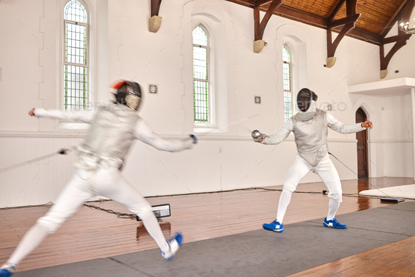 Fencing, sport and men with sword to fight in training, exercise or workout in a hall. Martial arts