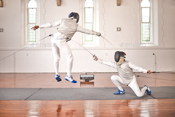 Fencing, sport and jump with sword to fight in training, exercise or workout in a hall. Martial art