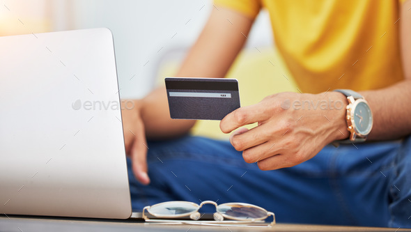 Credit card, hand and laptop for online shopping, digital sale and payment with technology. Web ban