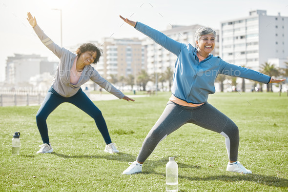 Women, senior and stretching in park, fitness and wellness with flexibility and start workout outdo