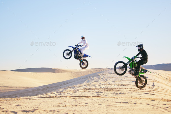 Motorcycle, desert and jump in air, speed and competition at outdoor race for performance, goal or