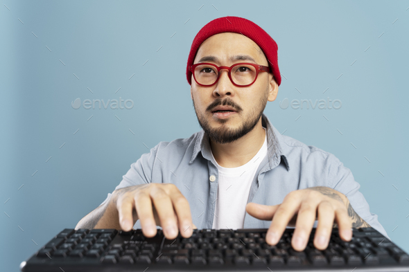 Korean programmer coding, typing on keyboard, working online isolated ...