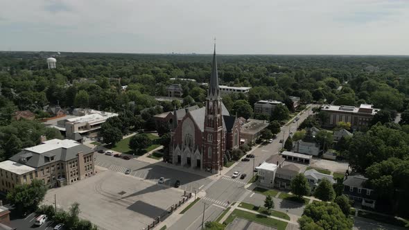 Aerial Shot of Church and Residential Urban Housing District in Naperville USA alt