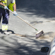 A group of construction workers are working on a street. - PhotoDune Item for Sale
