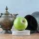 A fresh apple with an ancient cups on marble background - PhotoDune Item for Sale