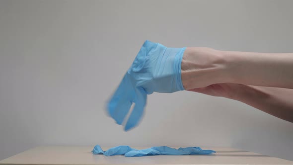 Girl Wears Disposable Medical Gloves