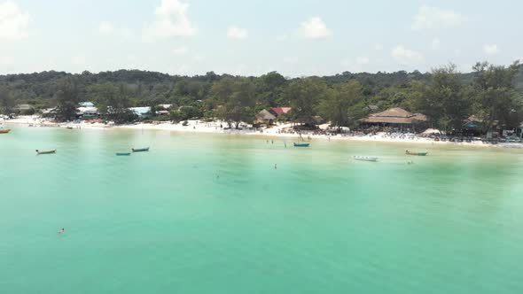 Fly over seal waters and approach beach bar, Koh Rong Samloem. Tropical Holidays  alt