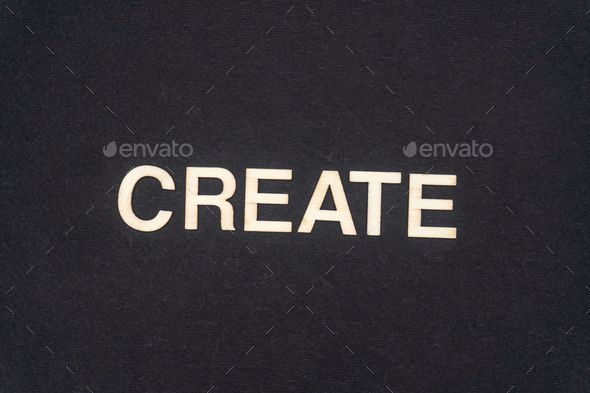 CREATE word written on dark paper background. CREATE text for your concepts