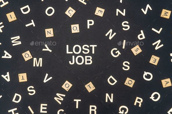 LOST JOB word written on dark paper background. LOST JOB text for your concepts