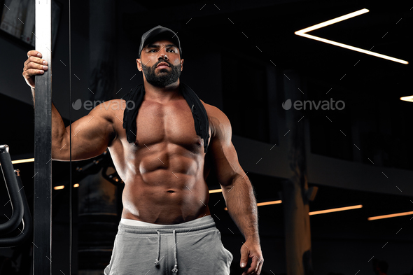 Brutal Strong Bodybuilder Athletic Man Posing Stock Photo