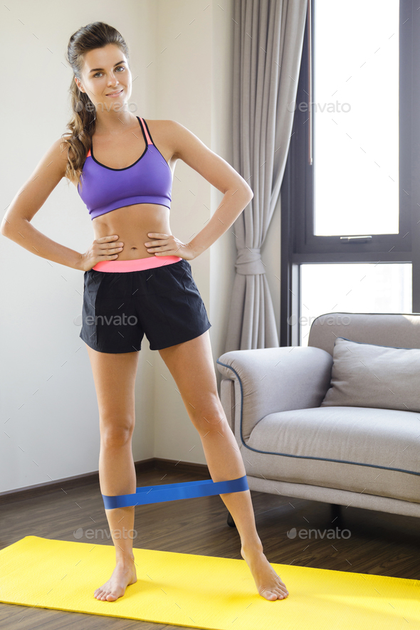 Fitness workout at home with rubber resistance band