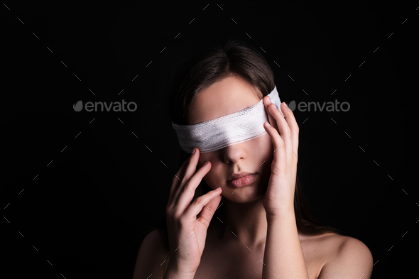 Blindfolded woman on a dark background - censorship, human rights ...