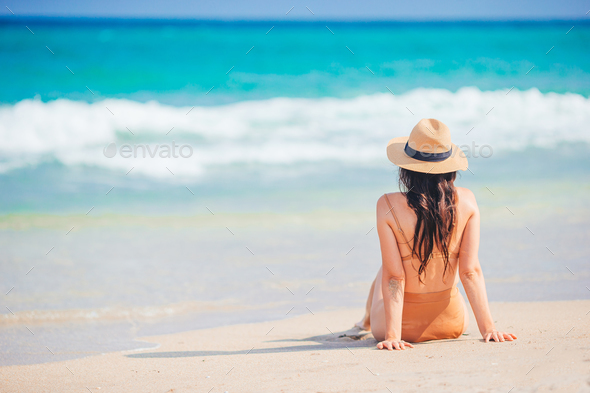 Beautiful women enjoying vacation on the beach