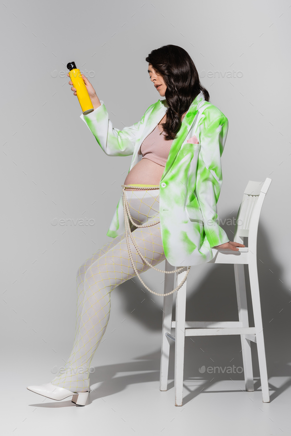 Woman Sitting in Shiny Leggings Stock Photo - Image of shiny