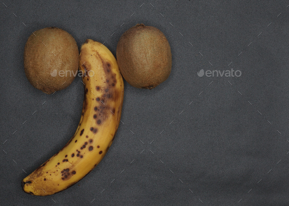 Banana and kiwi fruit. Problem with erection, sexual life. Copy-space. V