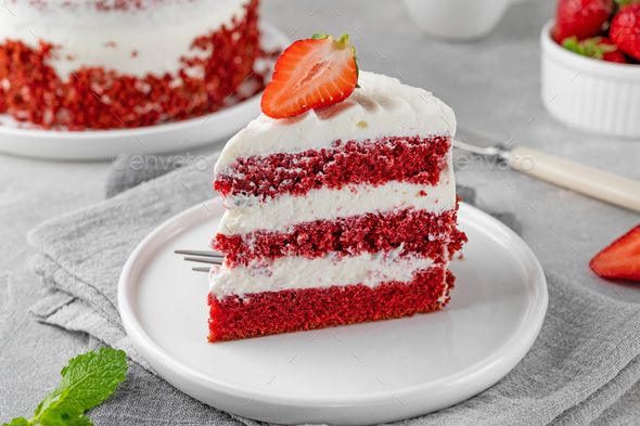 Red velvet cake with strawberries. Cake from red sponge cakes and cream  cheese frosting, Stock Photo by irataskova
