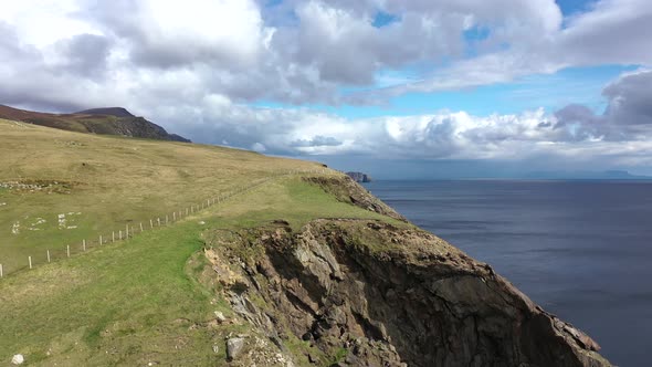 Aerial View of the Beautiful Coast at Malin Beg with Slieve League in the Background in County alt