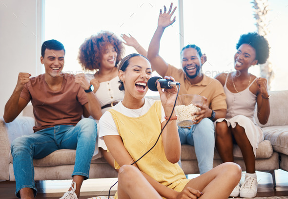 Microphone, happy people or friends singing in home living room ...