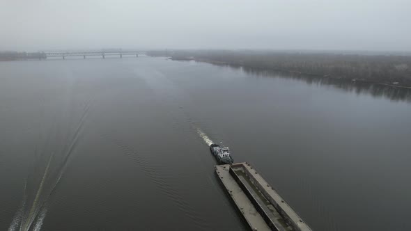 The Barge Floats on the River